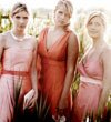 Bridesmaids in pink and peach dresses