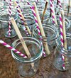 Pink striped straws by Joy Marie Photography